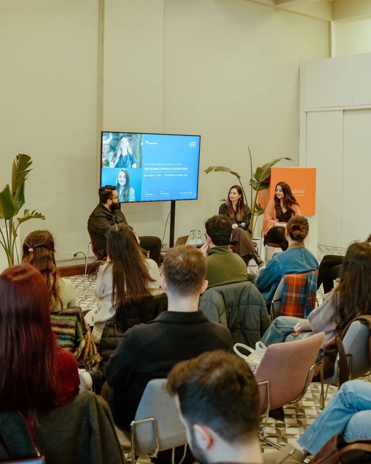 Community members attending a live talk